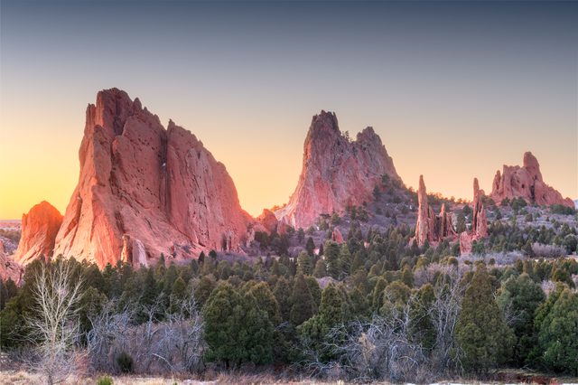 Colorado mountain landscape illustrating state child support enforcement tools including wage garnishment and license suspensions