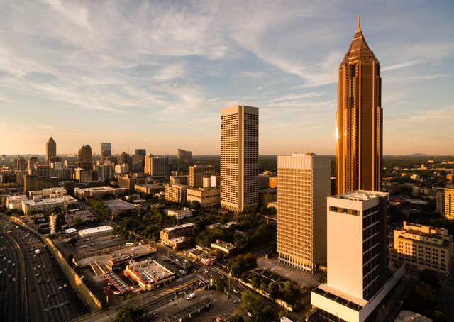 Atlanta skyline at dusk representing Georgia child support enforcement tools and legal remedies under OCGA Title 19