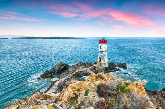 Maine lighthouse at sunrise representing property division in divorce proceedings