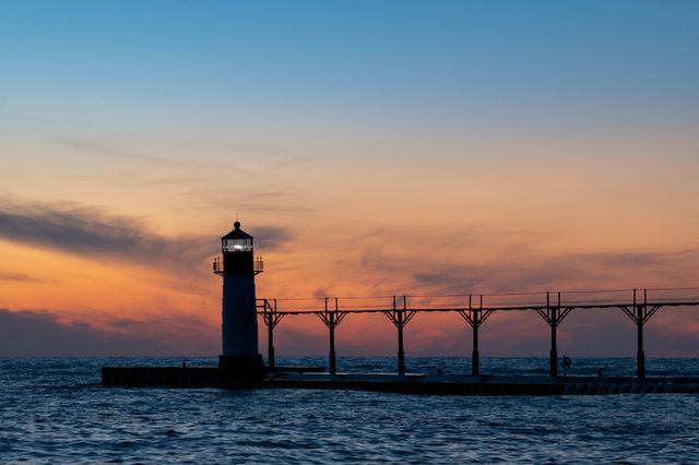 Michigan lighthouse at sunset representing spousal support and divorce financial planning