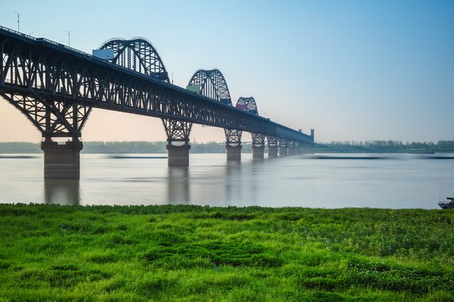 Mississippi river bridge at sunrise representing Mississippi DIY divorce filing options