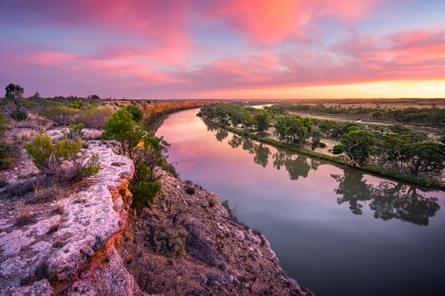 Oklahoma sunset landscape representing child support enforcement tools under Title 43