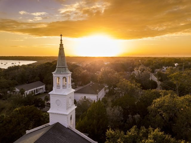 Historic South Carolina church steeple at sunset representing divorce timeline jurisdiction