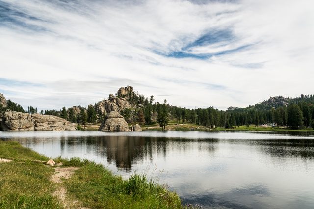 Wyoming mountain landscape representing child support enforcement under DFS and state statute